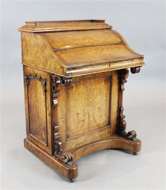 A Victorian burr walnut davenport, W.2ft 3.5in. D.1ft 11in. H.3ft 2in.
